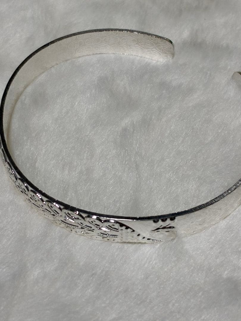 スターリングシルバー999 孔雀バングル11.2g - メルカリ