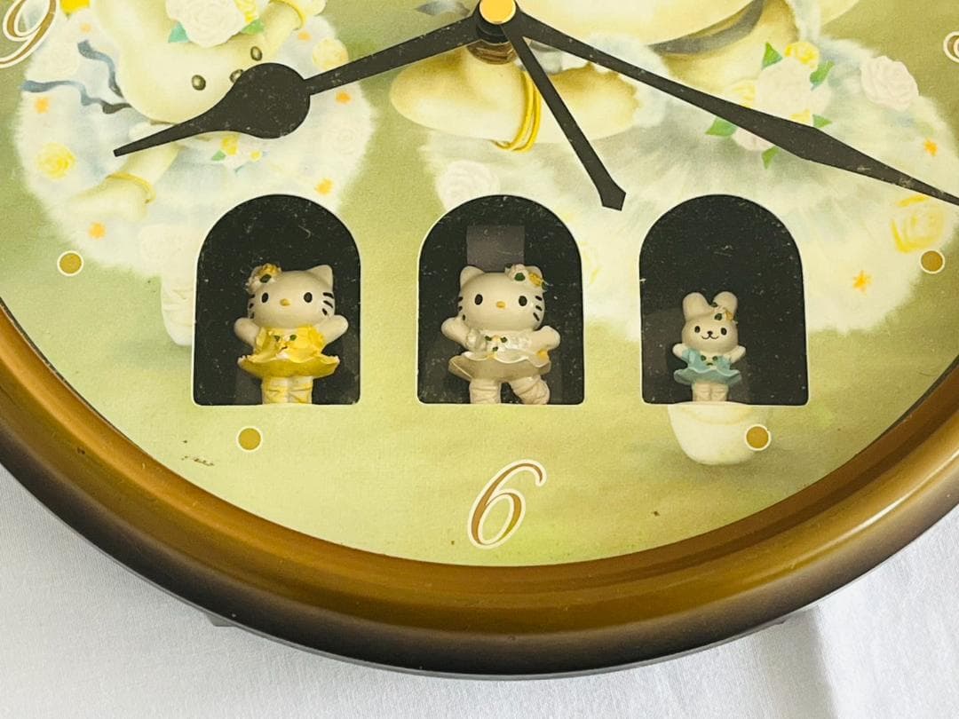 □ハローキティ からくり時計 バレリーナ 掛け時計 直径26cm - メルカリ