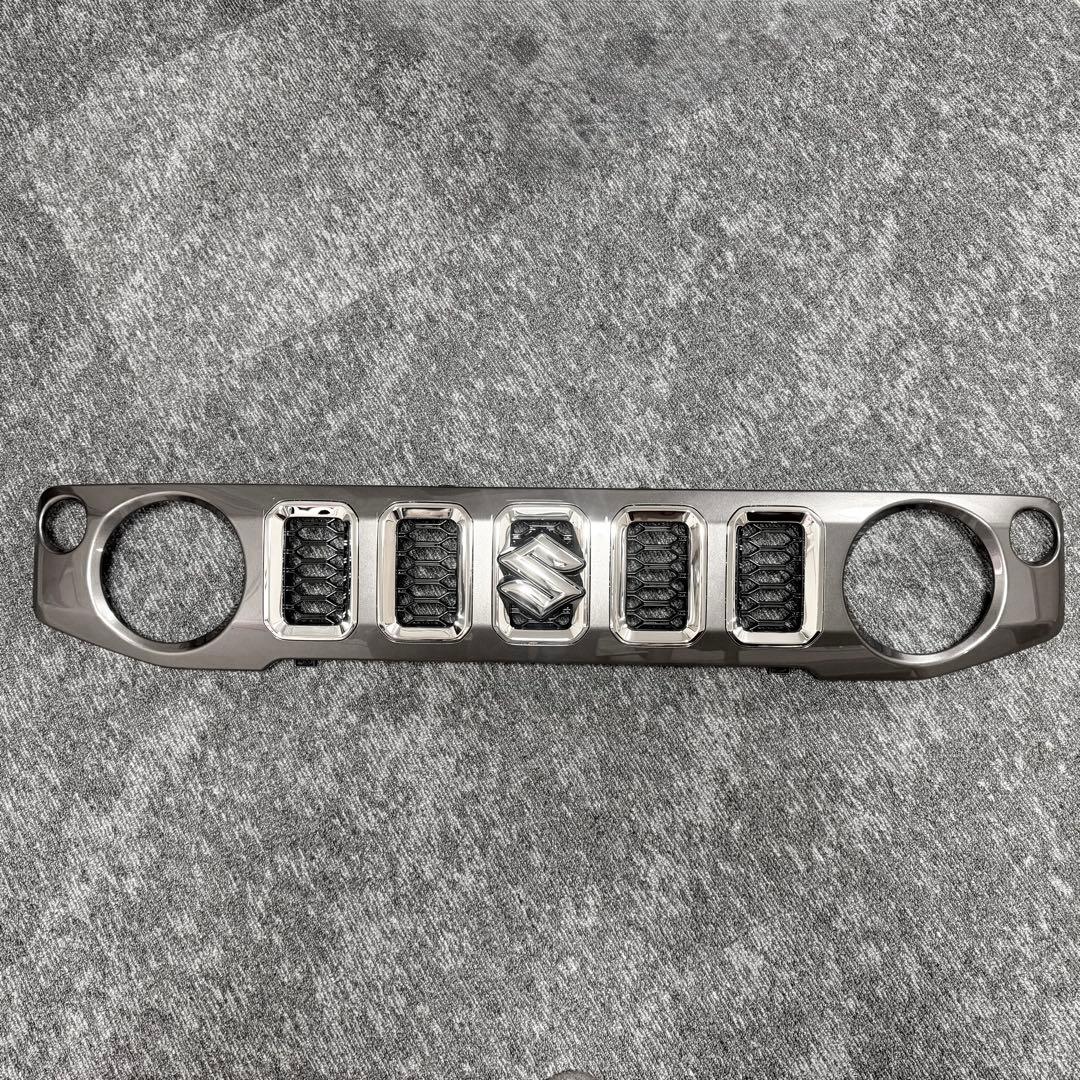 スズキ ジムニーノマド 純正フロントグリル - メルカリ