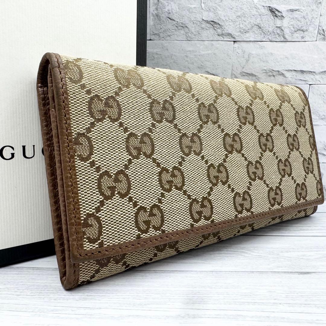 美品】GUCCI GGキャンバス 長財布 二つ折り ブラウン レザー - メルカリ