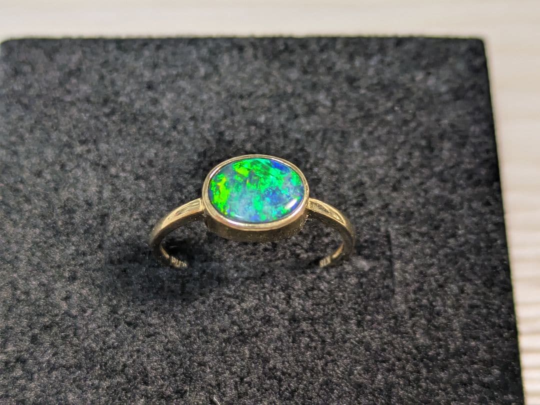 K18 0.77ct 12号 ボルダーオパールリング