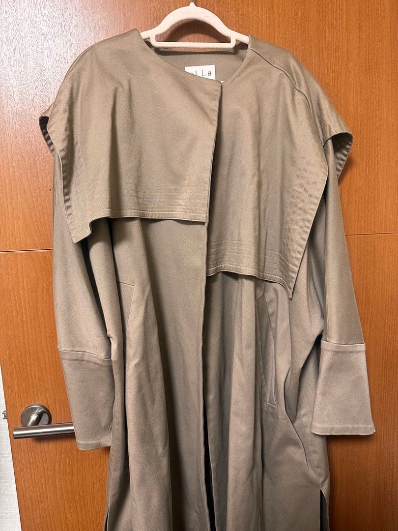 ella_selectshop コットンツイルアシンメトリーコート ベージュ - メルカリ